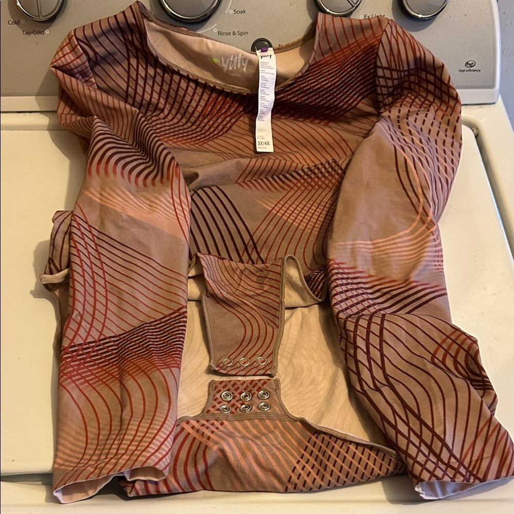 YITTY Red and Tan Geometric long sleeve Bodysuit.